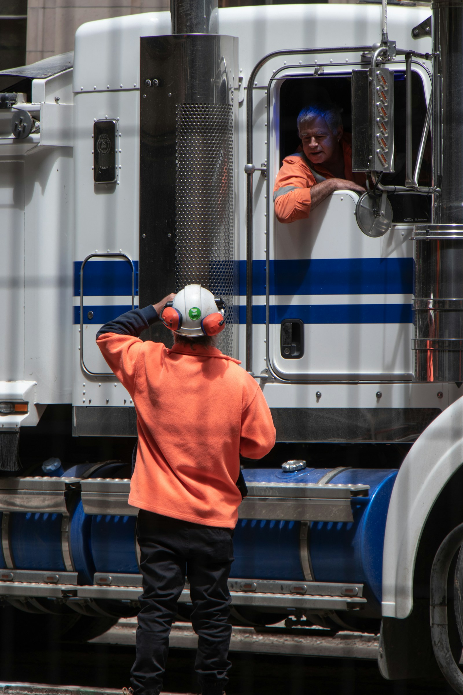 Fleet specialist beside a commercial vehicle