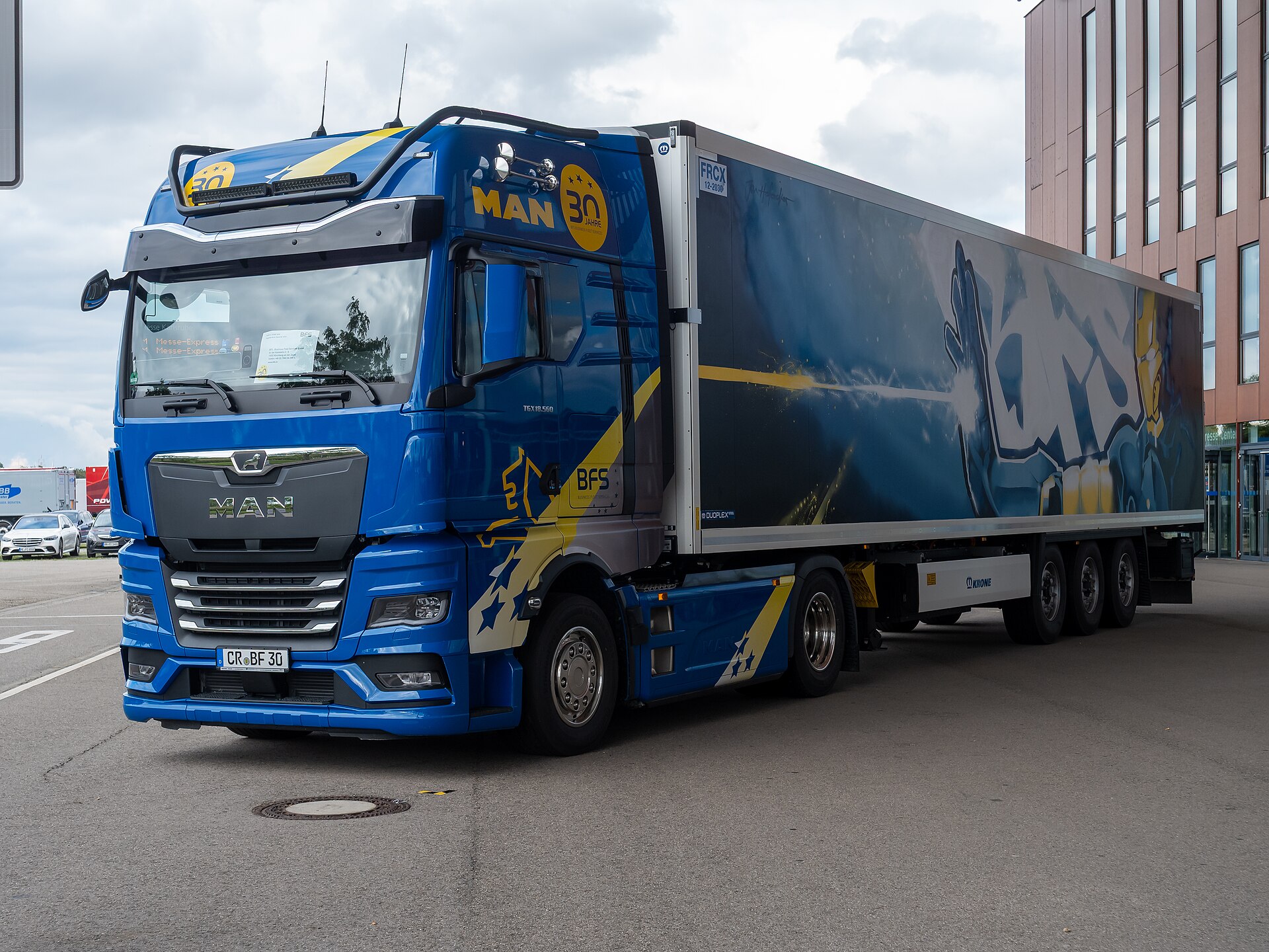 Blue MAN TGX heavy-duty truck