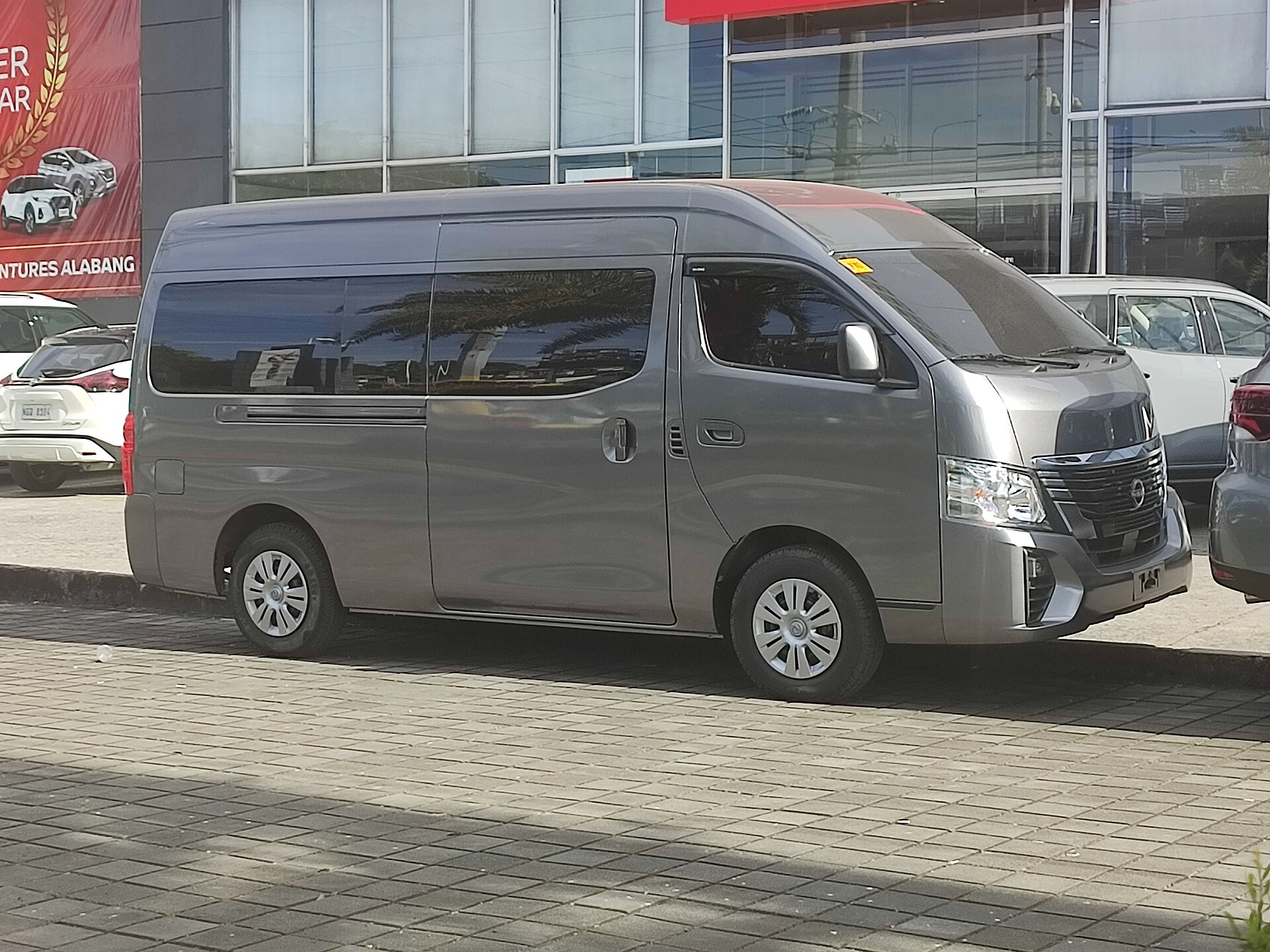 Grey Nissan Urvan commercial van
